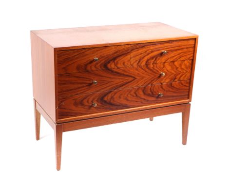 A Uniflex mid century modern teak chest of two short and two long drawers, on tapering square legs, 92cms wide.Condition Repo