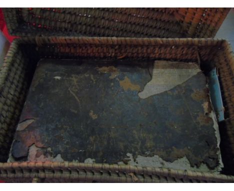 Antique family bible + 1 other book in a vintage wicker basket