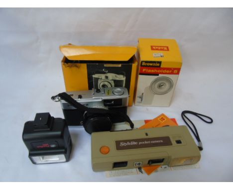 Collection of vintage cameras and camera parts