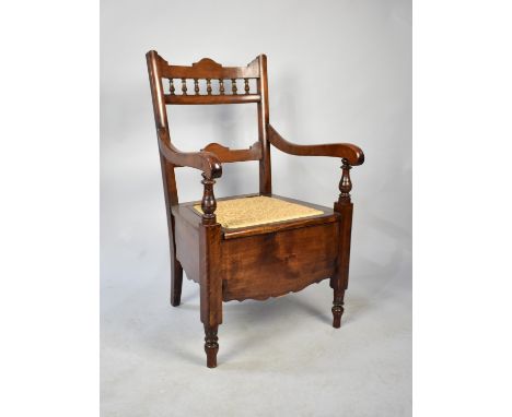An Edwardian Commode Armchair with Ceramic Liner
