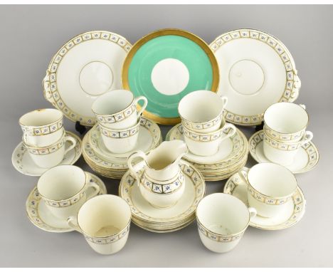 A Late 19th Century Porcelain Tea Set Decorated with Gilt and Blue Trim to Comprise Cups, Saucers, Side Plates, Cake Plates a