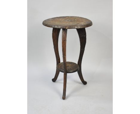 A Carved Circular Table on Cabriole Tripod Support, Decorated in Relief with Flowers, Circular Stretcher, 45cms Diameter