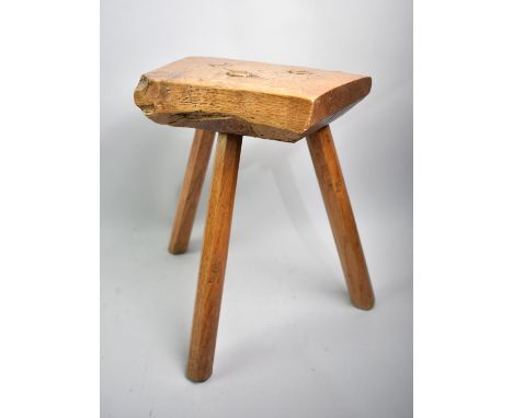 A Small Vintage Elm Seated Three Legged Milking Stool, 33cms High
