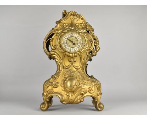 A Mid 20th Century Continental Moulded Brass Mantel Clock with Clockwork Movement, 48cms High