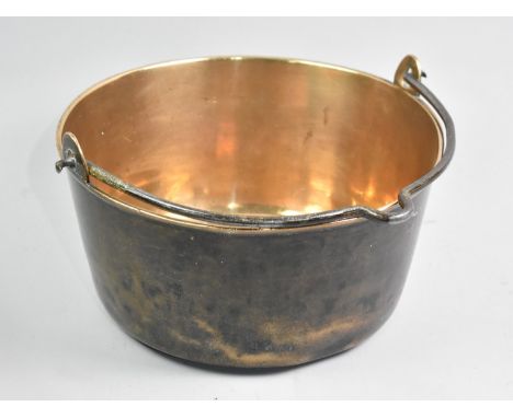 A Large Vintage Brass Jam Kettle with Iron Loop Handle, 34cms Diameter and 16cms High