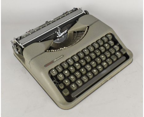 A Vintage Cased Empire Aristocrat Portable Manual Typewriter