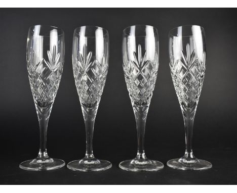 A Set of Four Cut Glass Champagne Flutes, 22.5cm high