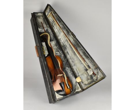 A Cased Violin and Two Bows