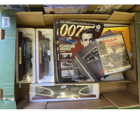 A mixed collection of items to include 3 Scale model locomotives on wooden plinths, steam train dvds, 007 magazines etc 