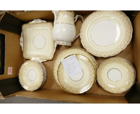 A collection of Paragon Cream &amp; Gilt decorated dinner ware including water jug, side plates, dessert plates. saucers etc 