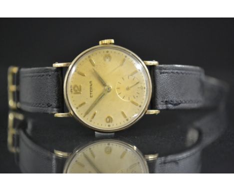 Eterna - a vintage gentleman's gold cased wristwatch, circular dial, quartered Arabic numerals, boat batons,  minute track, s