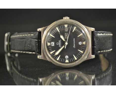 Omega -a Seamaster automatic wristwatch, black dial illuninous Arrow batons and hands, minute track, centre seconds, day and 