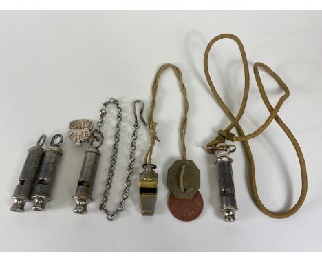 Militaria interest, collection of issue  whistles to Include RAF Am ditching Whistle with Dog tags , 2 ARP whistles with badg