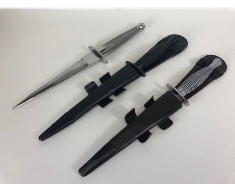 Militaria interest, three Fairburn Sykes design knives, a third pattern with blackened finish the cross guard stamped R Coope