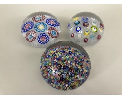 Art Glass, three Baccarat glass paperweights of Millefiori design complete with boxes 