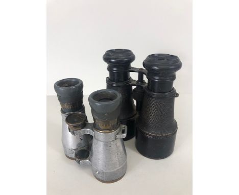 Militaria Interest, pair of WW1 British officers binoculars Army and Navy stores limited, along with a pair of WW1 German bin