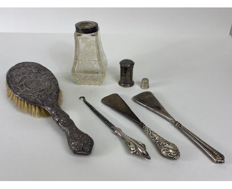 Collection of hallmarked silver mounted items to include hairbrush A.F, 2 shoe horns, button hook, pounce (22.7g) thimble, gl
