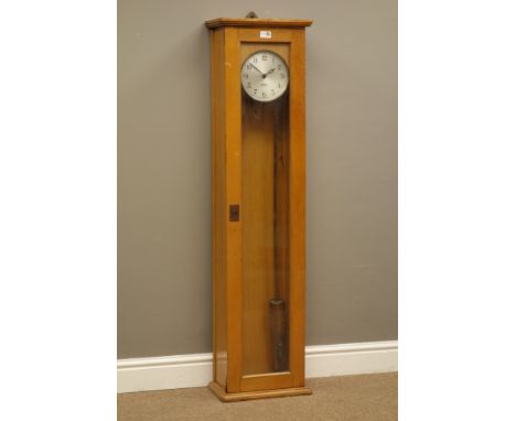Gents' of Leicester Pul-Syn-Etic Impulse factory slave clock with circular silvered dial, in glazed door light oak case, with