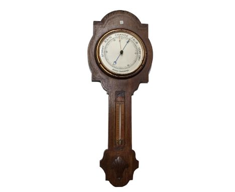 Art Nouveau oak and boxwood inlaid aneroid barometer/thermometer, 31" high 