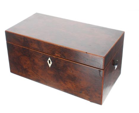 Georgian yew wood tea caddy,&nbsp;the hinged cover enclosing divided interior with two boxes and circular reveal for a jar (l