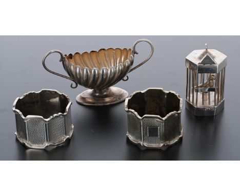 Pair of engine turned silver napkin rings, maker 'BL, 2.1oz t;&nbsp;also miniature silver twin handled vase and a novelty whi