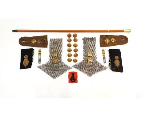 A collection of military items, including a pair of chain mail epaulets with British Royal army officers star badges, a set o