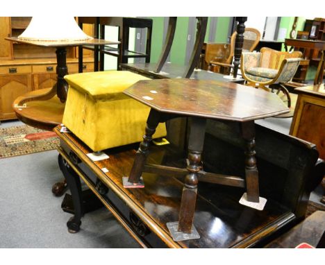 An upholstered Ottoman with hinged top, an octagonal oak low table and a tripod table reduced in height (3)