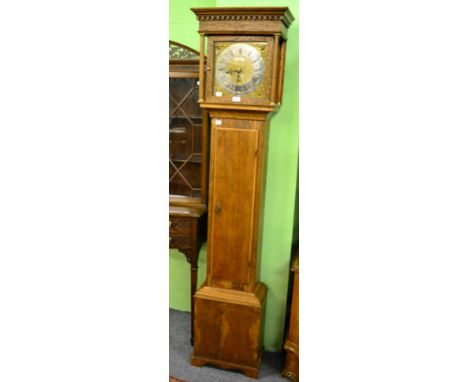 An oak longcase clock 