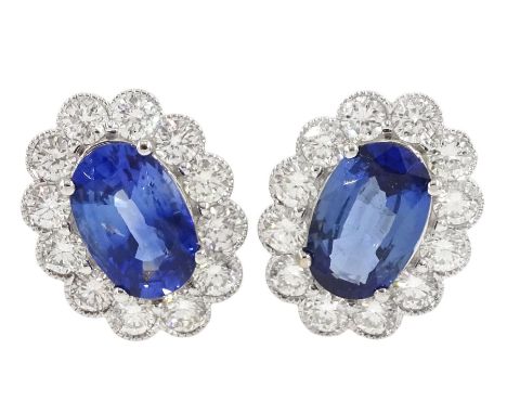 Pair of 18ct white gold milgrain set oval sapphire and round brilliant cut diamond stud earrings, total sapphire weight appro