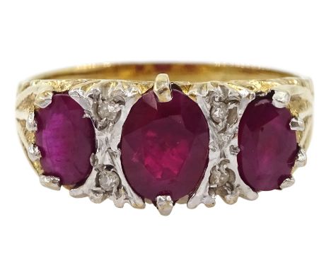 9ct gold ruby and diamond chip ring, hallmarkedCondition Report:Approx 3.45gm, size Q-R, max depth = 9mm, good condition