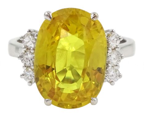 18ct white gold oval yellow sapphire and six stone round brilliant cut diamond cluster ring, hallmarked, sapphire approx 8.60