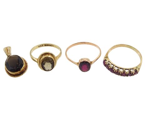 Gold smoky quartz ring and pendant and two gold garnet rings, all 9ct Condition Report:Approx 7.45gmfive stone garnet size R,