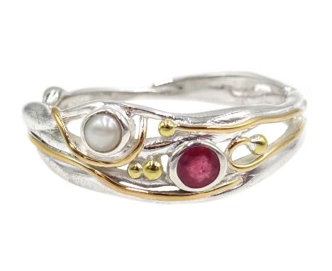 Silver and 14ct gold wire ruby and pearl ring, stamped 925 Condition Report:Size N-O, good condition 