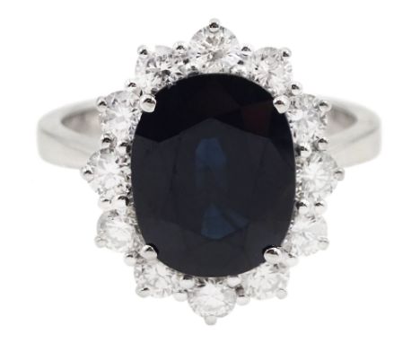18ct white gold oval sapphire and round brilliant cut diamond cluster ring, hallmarked, sapphire approx 3.50 carat, total dia