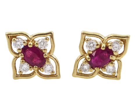 Pair of 9ct gold oval ruby and round brilliant cut diamond flower design stud earringsCondition Report:Approx 1.9gm, tested 9