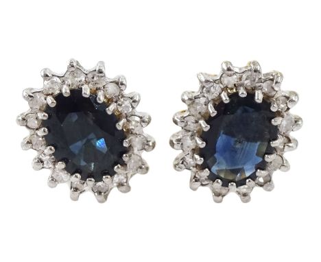 Pair of 9ct gold oval sapphire and diamond cluster stud earrings, hallmarkedCondition Report:Approx 2.05gm, head = 10.5mm x 9