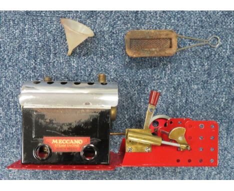 Meccano live steam engine, red baseplate, lever and flywheel, generally good plus to good, has been fired, with burner tray a