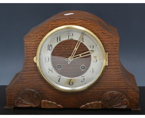Walnut cased mantel clock, silvered chapter ring, movement striking on a gong, 32cms and two oak cased mantel clocks, (3).
