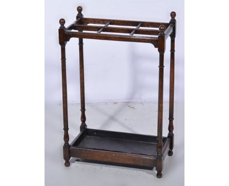 Oak stick stand, 47cms, wooden 5ft rule, a boxwood 4ft rule by Loftus, London, etc.