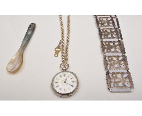 Edwardian silver linked and ribbon nurse's belt, the clasp marked Chester 1910, a silver-mounted horned spoon and a silver fo