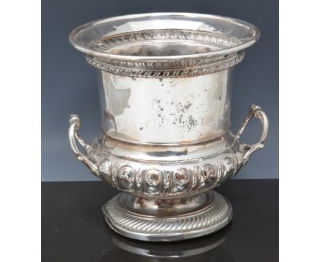 Plated campana-shaped ice bucket, 23cms and a plated three-light candelabra, (2).
