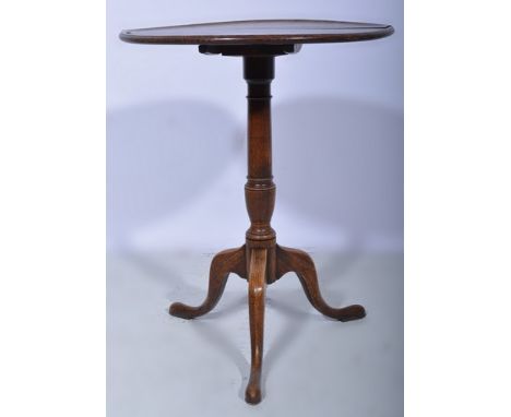 Mahogany pedestal table, circular tilt top, baluster column, tripod legs, diameter 53cms.