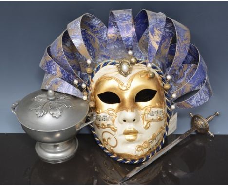 Brass oil lamp, with frosted shade, Venetian Carnival mask, giltwood eagle pediment piece, beer mats and other items.