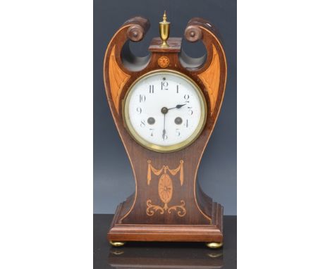 Edwardian inlaid mahogany mantel clock, scrolled top with marquetry decoration, white enamelled dial, cylinder movement, stri