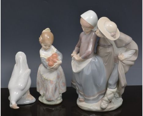 Lladro group, of a young couple, 23cms, a Lladro figure of a girl with oranges and a Nao model of a Goose, (3).