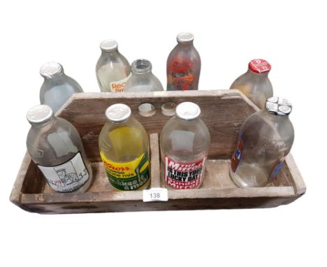 WOODEN CRATE WITH 9 VINTAGE MILK BOTTLES 