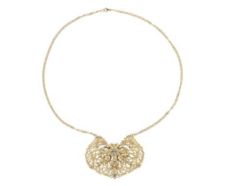 DIAMOND-SET NECKLACE Of Iberian inspiration, the openwork pendant of scrolling design, accented with rose-cut diamonds within