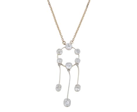 DIAMOND PENDANT NECKLACE Of openwork circular design, set with cushion-shaped diamonds, suspending knife-wire links of simila