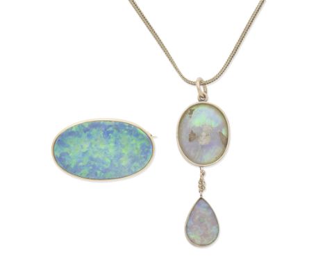 OPAL PENDANT/NECKLACE AND BROOCH/PENDANT 1st: The oval opal cabochon suspending a pear-shaped opal cabochon, from a foxtail-l