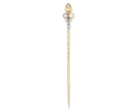 COLOURED DIAMOND STICK PIN Set with a pear-shaped diamond of brownish-orange tint and circular-shaped diamonds of pink, green